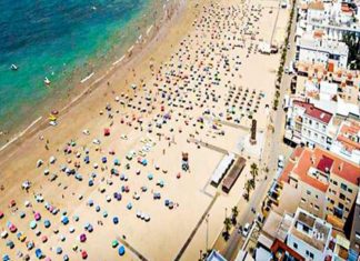 Praia dá certo na Espanha e vira exemplo de distanciamento social