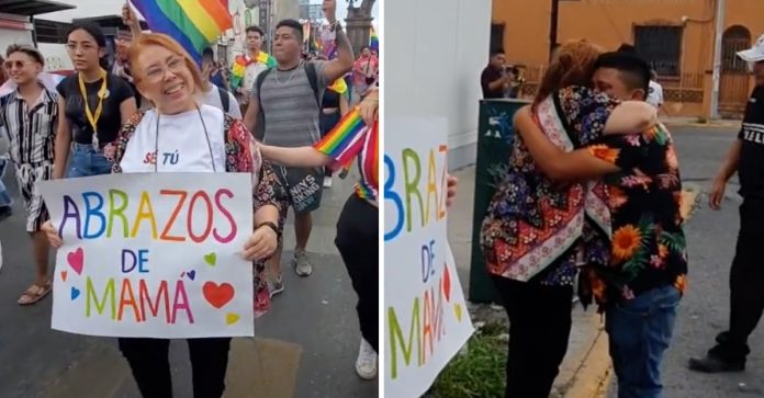 Mulher emociona ao oferecer “abraços de mãe” na Parada LGBTQIA+